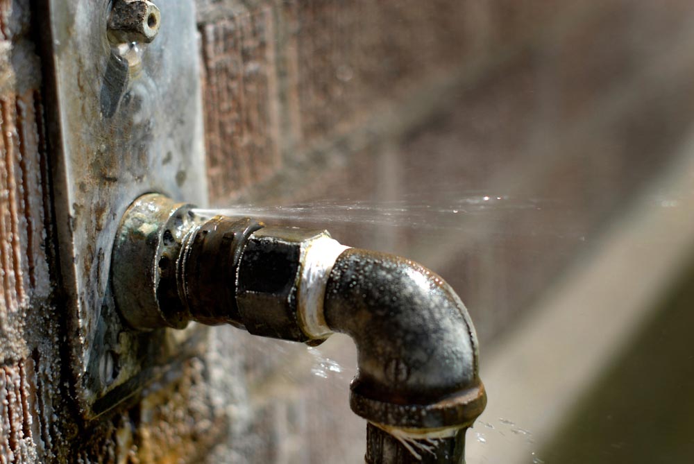exposed, leaky pipe lines